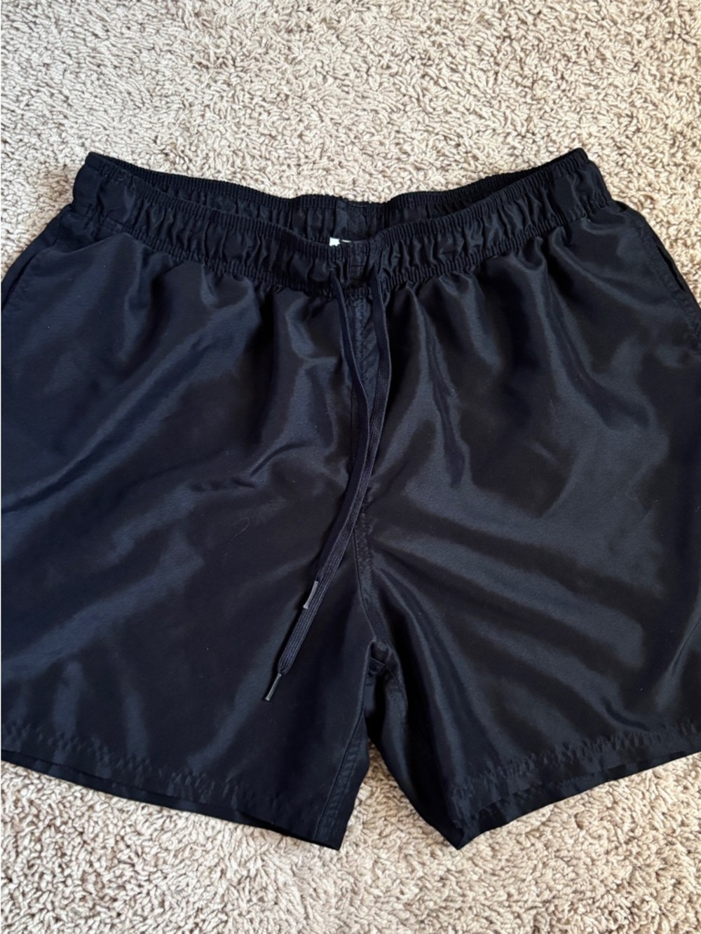 Nike Black Athletic Shorts with White Logo Tag